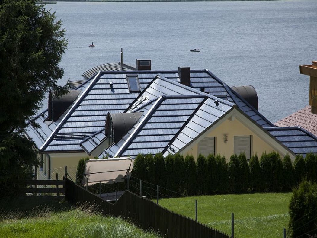 Blick über das Dach auf den See Ferienwohnung FeWo Villa am Hopfensee